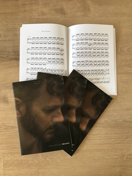 Piano sheet music book Images by DeLange
